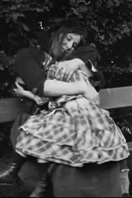    A woman loses her only child. She turns to drink and begins to hallucinate an image of her beloved child.  